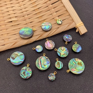 Natural abalone shell charms in round and oval shapes with colorful iridescent luster