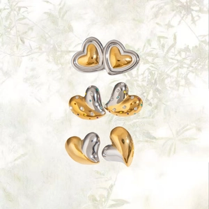 Trois paires de boucles d'oreilles cœur bicolores en acier inoxydable or et argent
