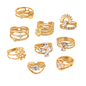 Nine-piece bohemian gold stainless steel ring set with shell, starfish, and sun motifs