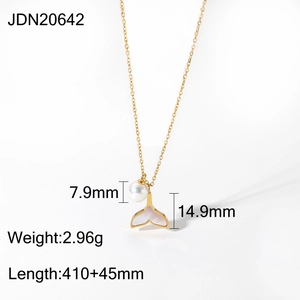 Golden mermaid tail necklace with pearl and shell inlay against a white background