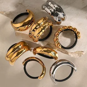 Minimalist stainless steel hair ties set in gold and silver with various metal designs
