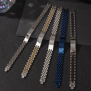 Minimalist stainless steel link bracelets in five metallic colors on a dark stone background