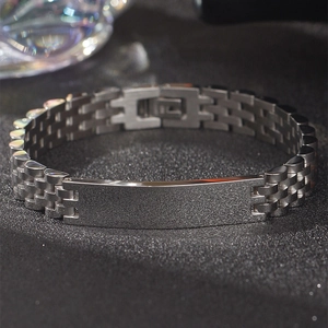 Close-up of premium stainless steel watch-style bracelet with matte texture link details