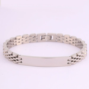 Close-up of silver stainless steel link bracelet with engravable blank rectangle ID plate