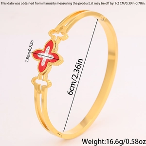 Detailed view of titanium steel clover bracelet with dimensions and red stone inlay