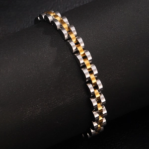 Detailed macro view of two-tone stainless steel watch band link bracelet with polished finish