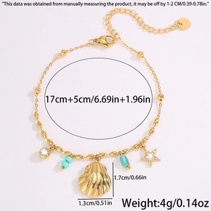 Vue détaillée du bracelet de plage en acier titane doré avec breloque coquillage et mesures