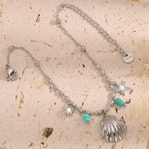 Bracelet en acier inoxydable style plage avec pendentifs coquillage et turquoise