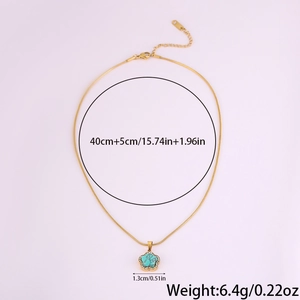 Vue détaillée du collier fleur turquoise avec dimensions de chaîne 40cm plus 5cm