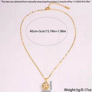 Detailed view of gold clover necklace with shell inlay and lobster clasp dimensions