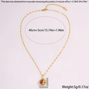 Detailed view of gold clover pendant with colorful heart crystals and size measurements