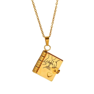 Gold book-shaped locket necklace with parent-child hand engraving on white background