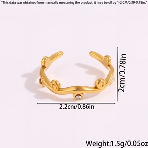 Detailed close-up showing dimensions of gold leaf ring with white zircon stones