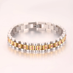 Detalle de la pulsera bicolor oro y plata con incrustaciones de piedras rosas