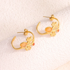 Boucles d'oreilles feuilles en C plaquées or 18k avec pierre œil de chat orange et cristal