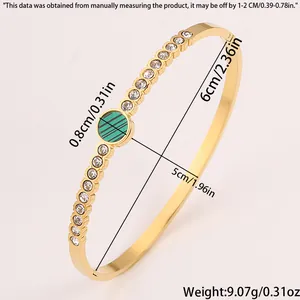 Detailed size chart for stainless steel gold bangle showing inner diameter and weight specs