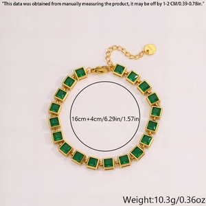 Detail view of gold-plated bracelet with green zircon, featuring lobster clasp and 16+4cm chain