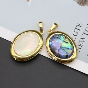 Oval gold plated locket pendants with white mother of pearl and abalone shell inlays