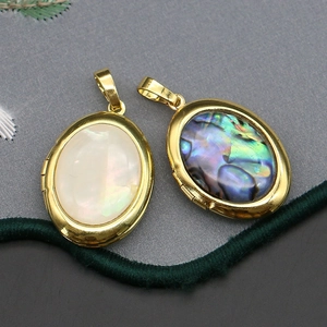 Vintage oval locket pendants made of natural mother of pearl and abalone shell with gold plating