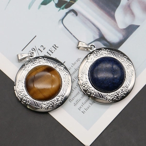 Vintage round locket necklace with tiger eye stone and floral relief engraving
