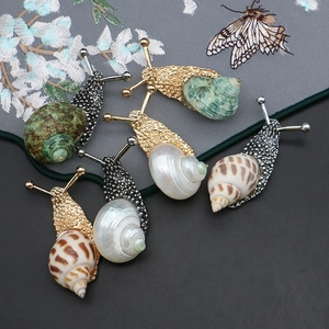 Elegant natural shell snail brooches in gold and silver plating with various spirals