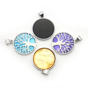 Natural sea shell round pendant with silver life tree design in blue and purple