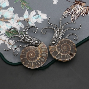 Vintage nautilus fossil pendant with steampunk silver octopus wrap on floral silk