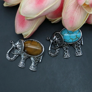 Elephant brooch pendants with tiger eye and turquoise stones in vintage silver finish
