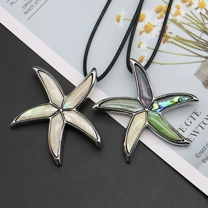 Artistic starfish pendant with natural mother of pearl and abalone shell in gold zinc alloy