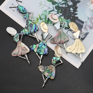 Five vintage ballet dancer shell brooches in colorful mother-of-pearl and silver metal frame