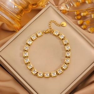 Elegant gold-plated stainless steel bracelet with square cubic zirconia in a jewelry box
