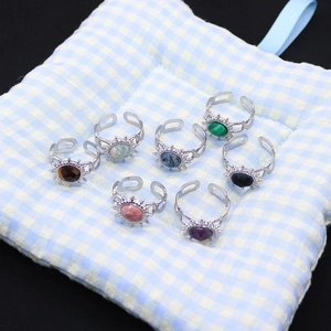 Set of 7 vintage stainless steel sunburst rings with colorful natural stones