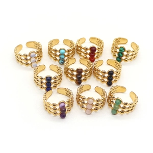 Vintage gold-plated stainless steel rings featuring triple-layered bands and natural stone gems
