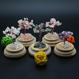 Natural crystal money trees set on bamboo bases for home decor and spiritual energy