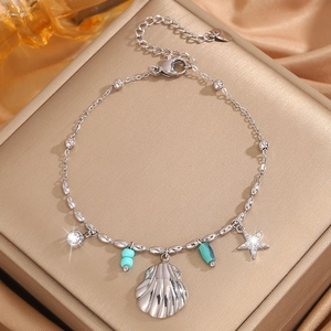 Bracelet en acier titane argenté style océan avec breloques étoile de mer