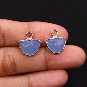 Close-up of lavender stone pendants with rose gold plating for DIY jewelry making