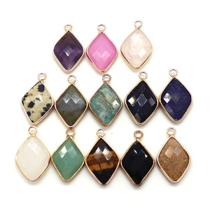 Faceted diamond-shaped natural stone pendants with gold plated edges and loops
