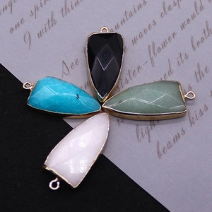 Set of four natural stone shield pendants with green aventurine and black onyx in gold frame