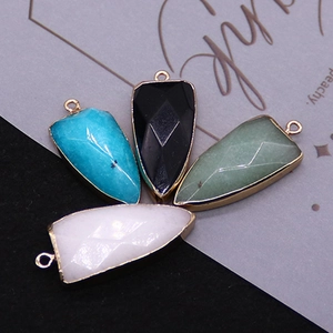 Arrowhead natural stone pendants with gold plated edges in four assorted colors