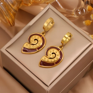 Boucles d'oreilles vintage en titane doré avec pendentifs spirales en émail brun-rouge