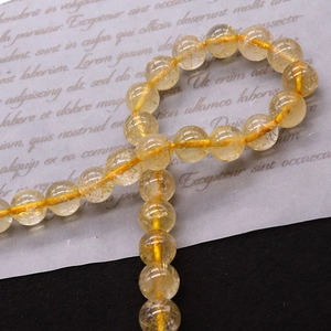 Bracciale in quarzo rutilato giallo naturale con perle tonde e inclusioni dorate
