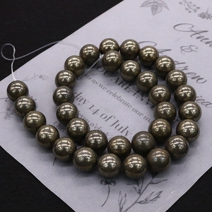 Polished natural pyrite round beads in a spiral strand for DIY jewelry necklaces