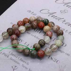 Natural round crystal gemstone beads with colorful mineral inclusions for DIY jewelry