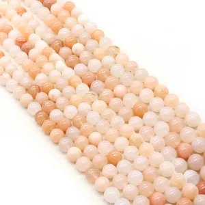 Polished natural aventurine round beads in peach tones for DIY jewelry necklaces