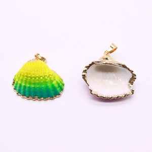 Natural sea shell pendant with gold plated edges and yellow-green gradient finish