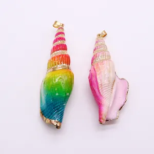 3D sea shell pendants with gold electroplated edges in rainbow and purple gradients