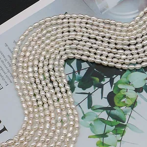 Natural white freshwater rice-shaped pearls for DIY necklace making on leaf card