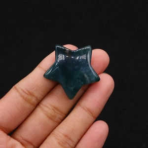 Moss agate star shaped natural stone carving held in hand for DIY jewelry making