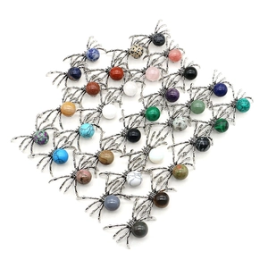 Variety of spider-shaped natural stone pendants in antique silver finish for DIY jewelry