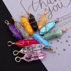 Set of handmade wire-wrapped crystal pendants in various hexagonal stone colors
